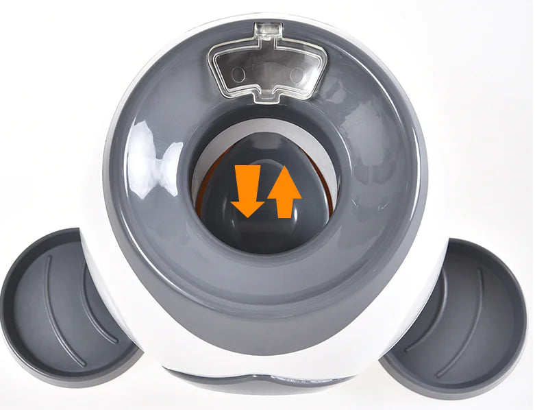 Top view of the interactive dog toy with ball feeder featuring a tennis ball launcher and treat dispenser.