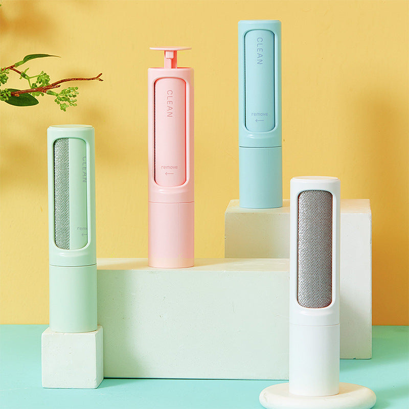 self-cleaning pet hair remover brush on display in various colors