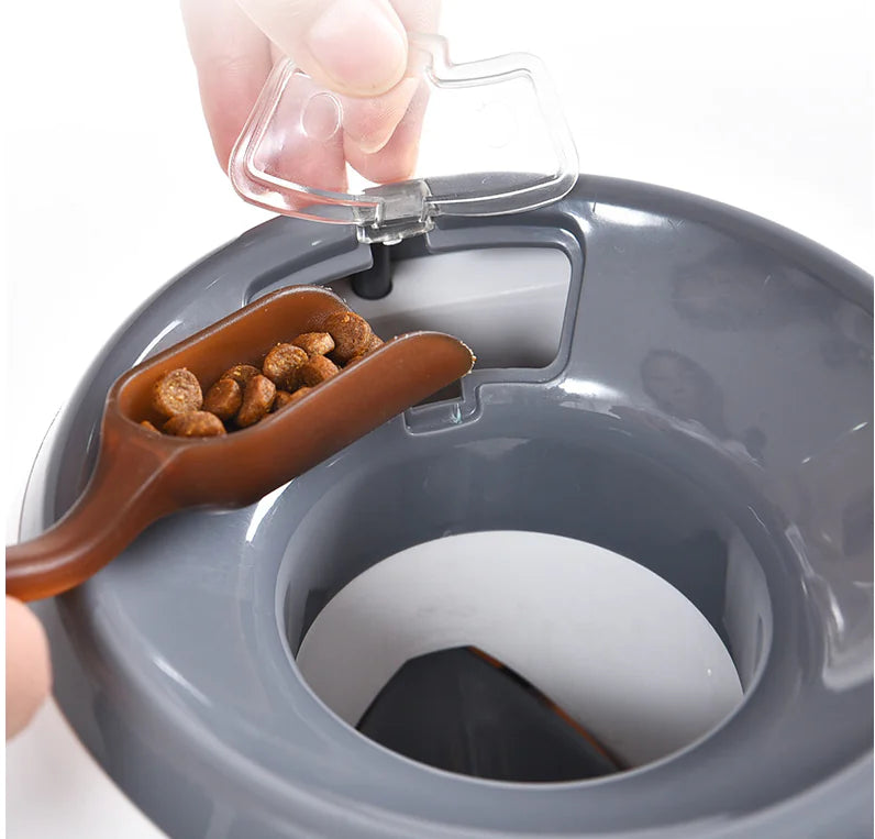 Interactive dog toy with ball feeder - close-up of treat dispenser mechanism