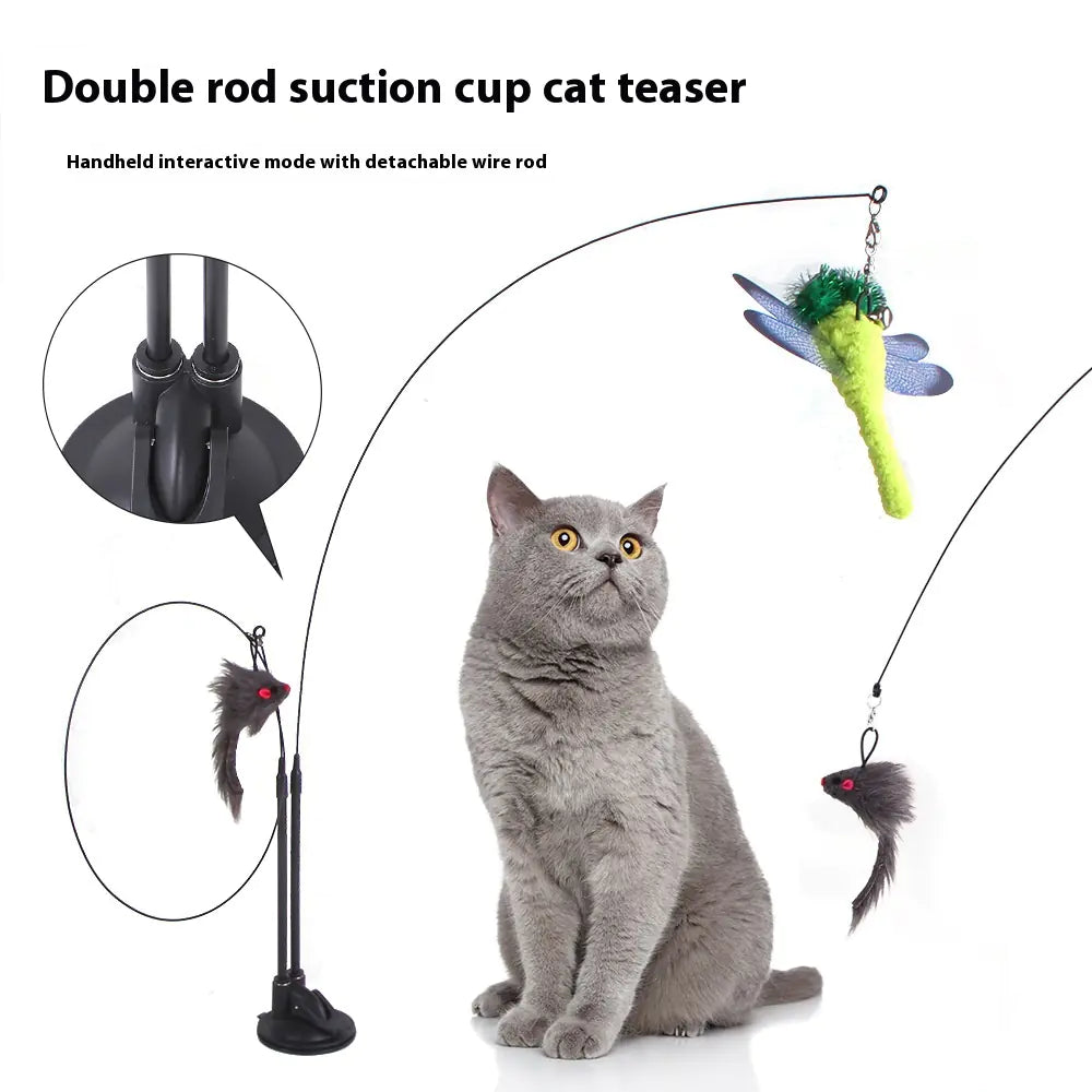 Interactive cat teaser toy with suction cup base featuring colorful feather attachments and curious grey cat looking up.