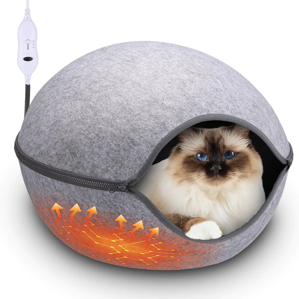 Indoor heated cat bed with a fluffy cat inside, showcasing warmth and comfort. Perfect pet bed for cozy indoor environments.