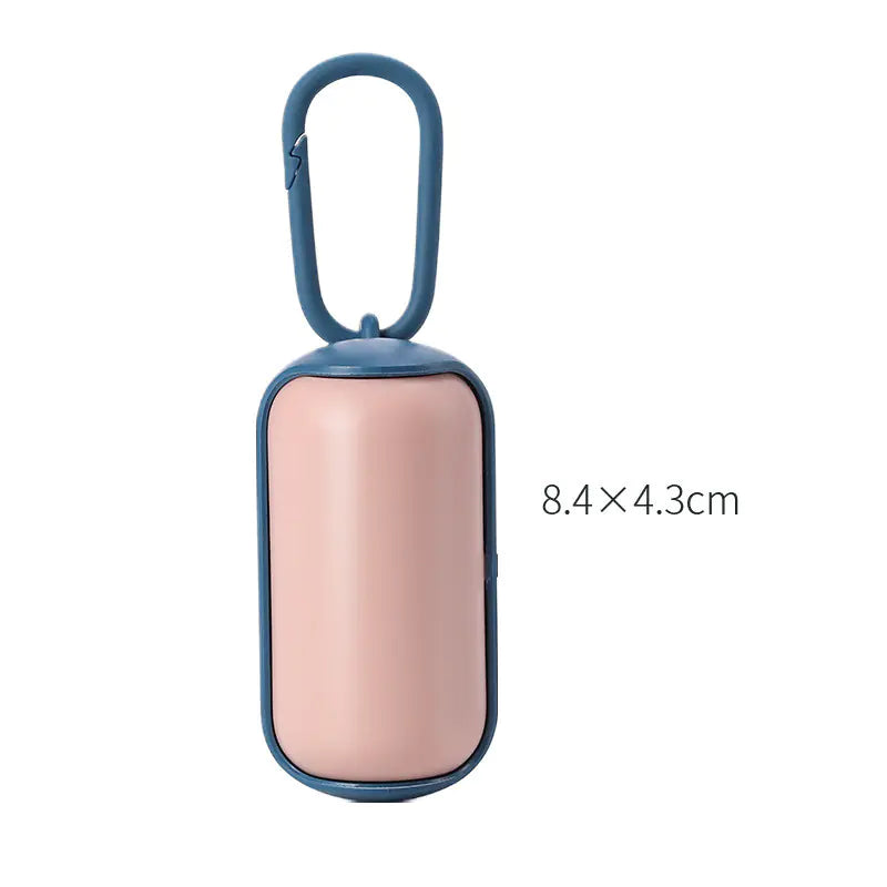 Portable pet litter box with sleek design and attached dog toilet picker, perfect for pet owners on the move.