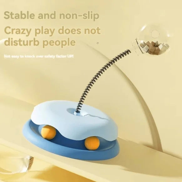 Interactive cat feeder toy with ball and spring mechanism for slow feeding