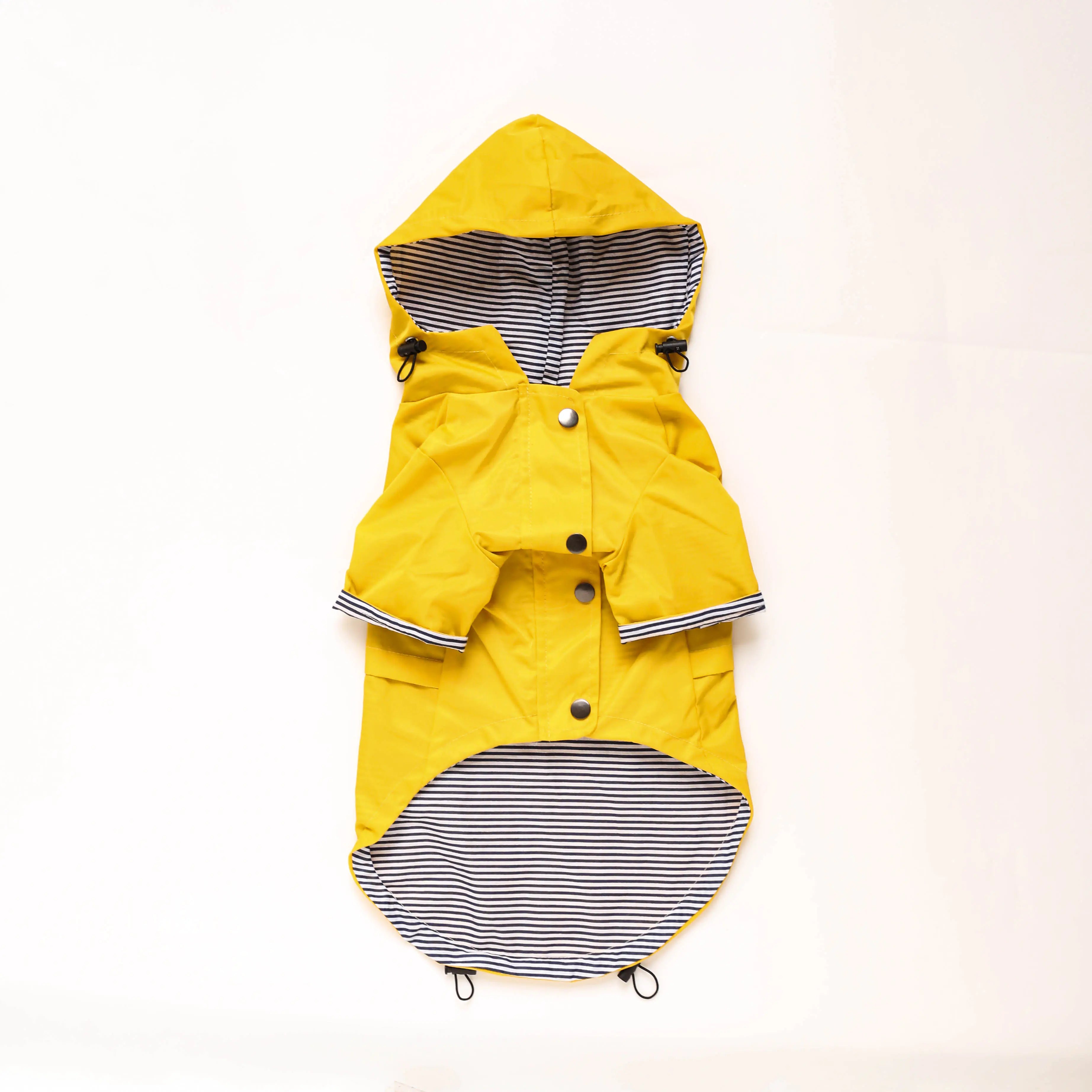 Yellow all-weather dog raincoat with hood and striped lining, designed for waterproof protection and comfort.