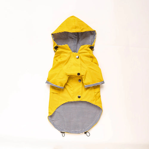 Yellow all-weather dog raincoat with hood and striped lining, designed for waterproof protection and comfort.