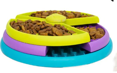 Dog educational toy Tornado Storm food dispenser with colorful rotating layers filled with kibble for cognitive development and play.