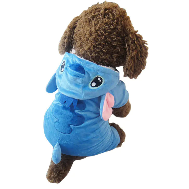 Cute dog in a blue velvet dog fashion suit with a hood, showcasing luxurious pet apparel perfect for special occasions and photo shoots.