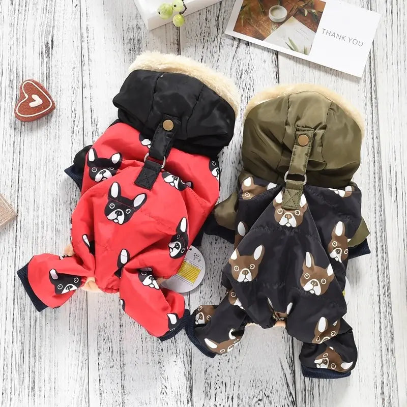 Two sets of comfortable dog clothing in red and black, featuring high-quality cotton four-legged outfits for pets, displayed on a wooden floor.