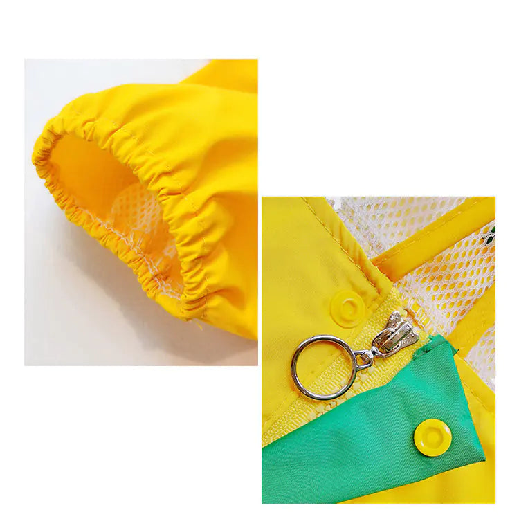 Detailed view of yellow dinosaur puppy raincoat with zipper and mesh lining