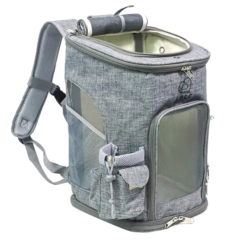 Gray pet carrier for small dogs and cats made of durable Oxford cloth with mesh windows and padded straps for comfort.