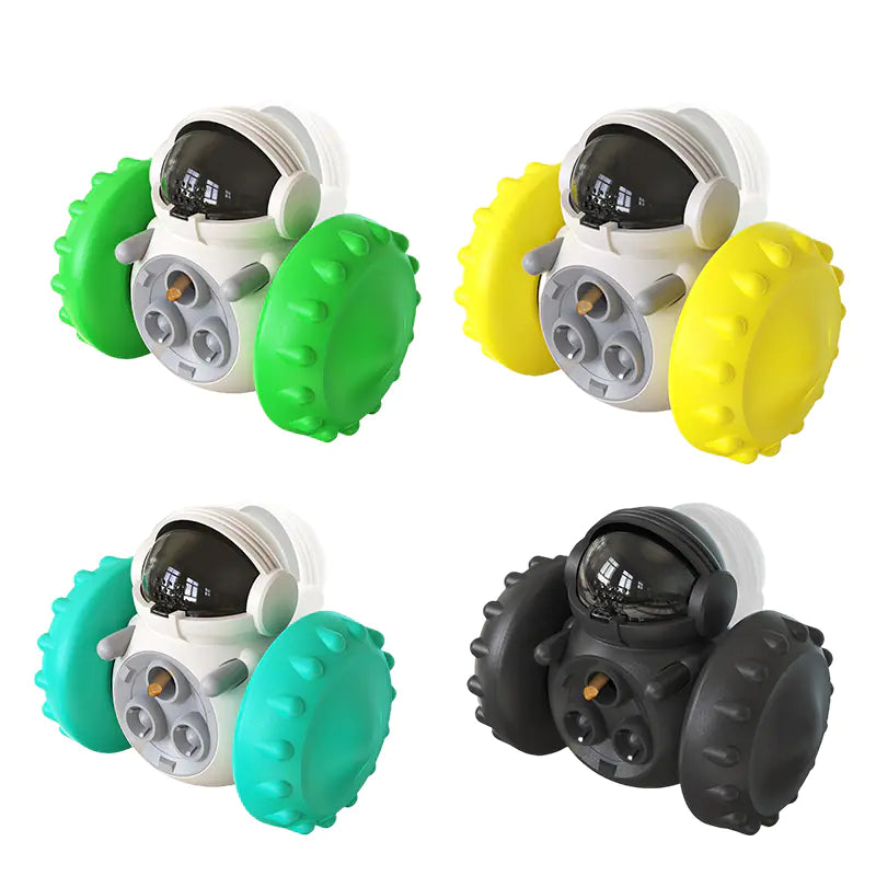 Colorful interactive dog toy food dispenser with tumbler design, available in green, yellow, teal, and black for slow feeding.