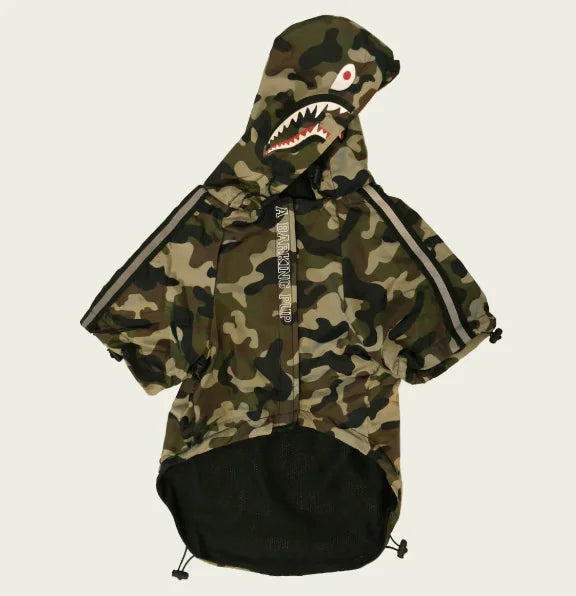 Camouflage waterproof dog raincoat with hood featuring fun shark design for stylish pet protection on rainy days.