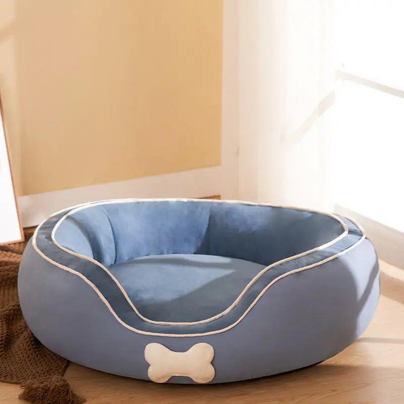 Blue small pet sofa bed made from cotton linen for cats and small to medium dogs, providing comfort and style in a cozy design.